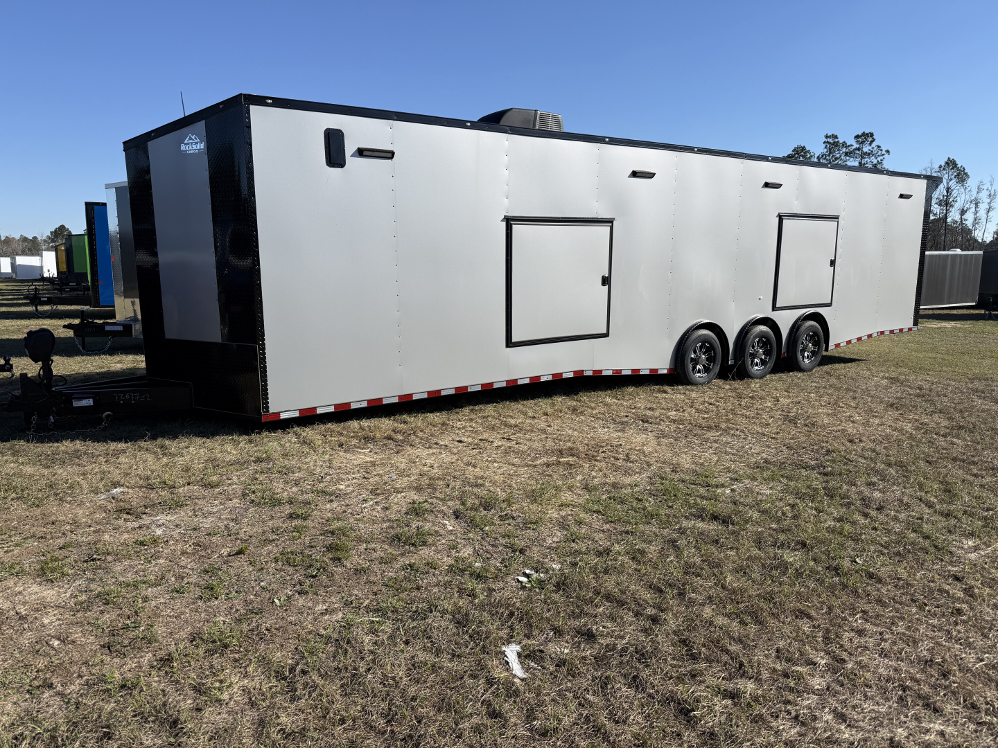 New 2027 Rock Solid Cargo 8.5x36 Triple Axle Super Sport Enclosed Cargo Trailer – Silver Polycore