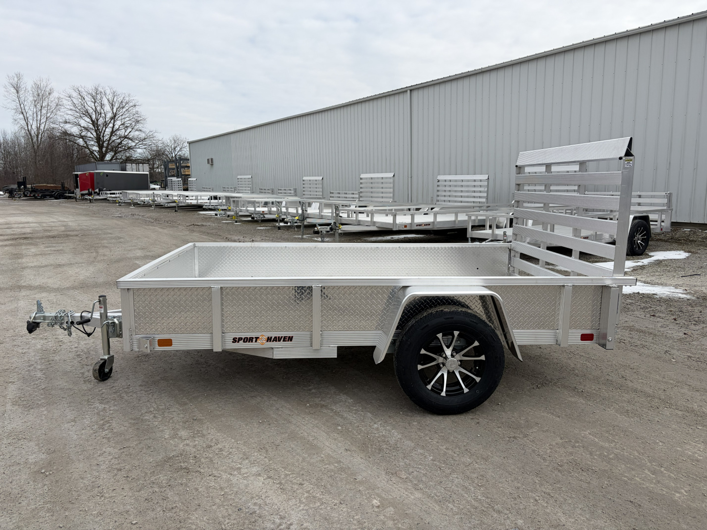New 2026 Sport Haven AUT610DS (6' x 10') 2.9K Utility Trailer w/ ATP Sides