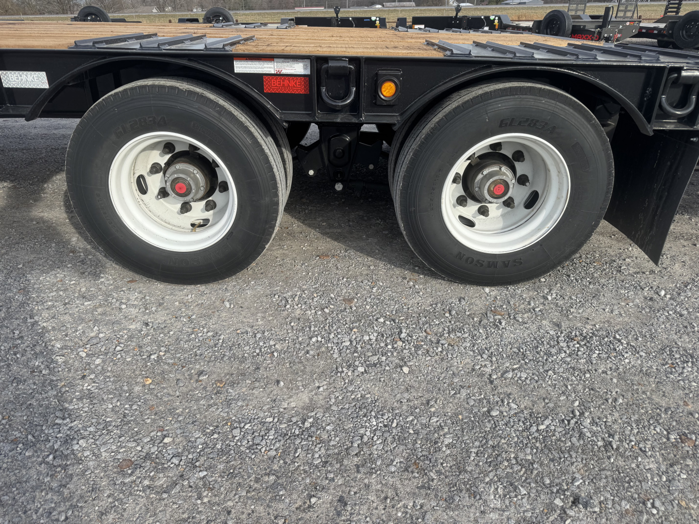 New 2027 Behnke 102"x27' 20 TON Pintle Hitch Tag Trailer *AIR RAMPS*