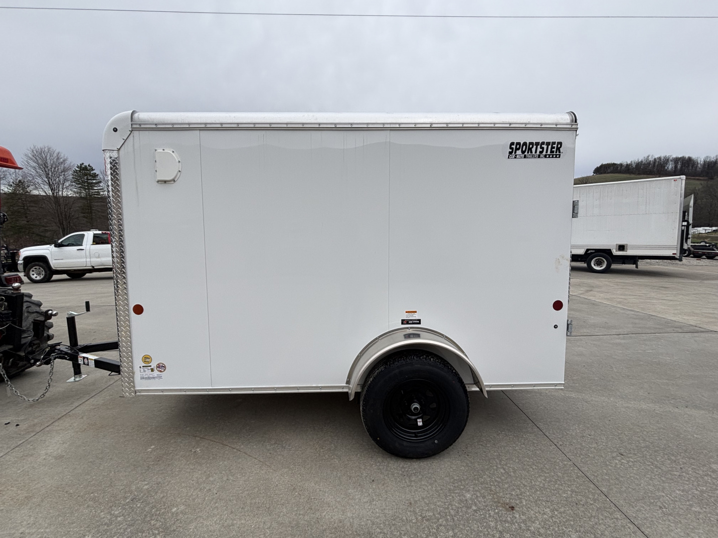 New 2027 Car Mate Trailers 5X10 Sportster Enclosed Trailer - Crystal White - 6" extra height - W/ Ramp Door - 2990# GVWR