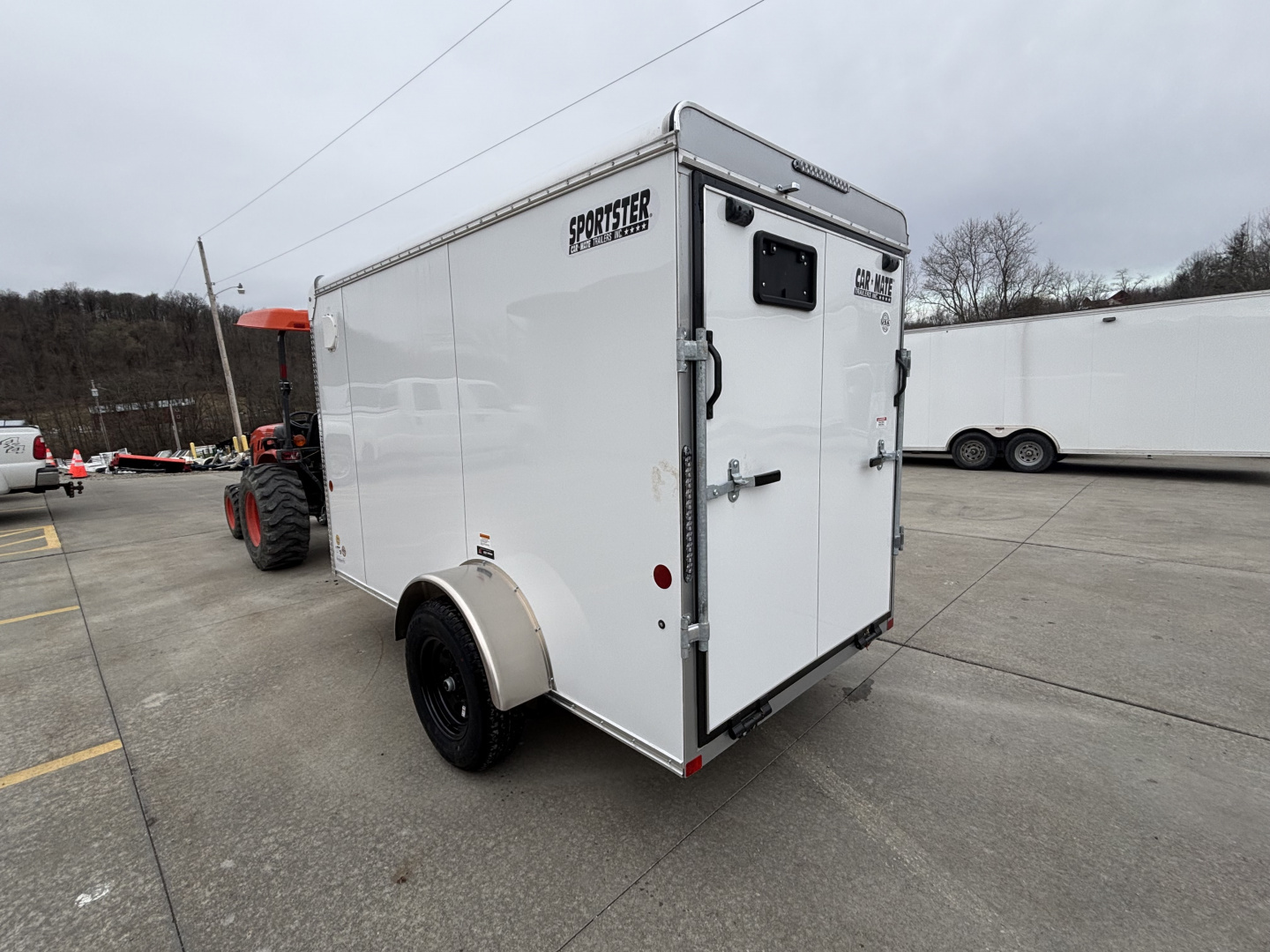 New 2027 Car Mate Trailers 5X10 Sportster Enclosed Trailer - Crystal White - 6" extra height - W/ Ramp Door - 2990# GVWR