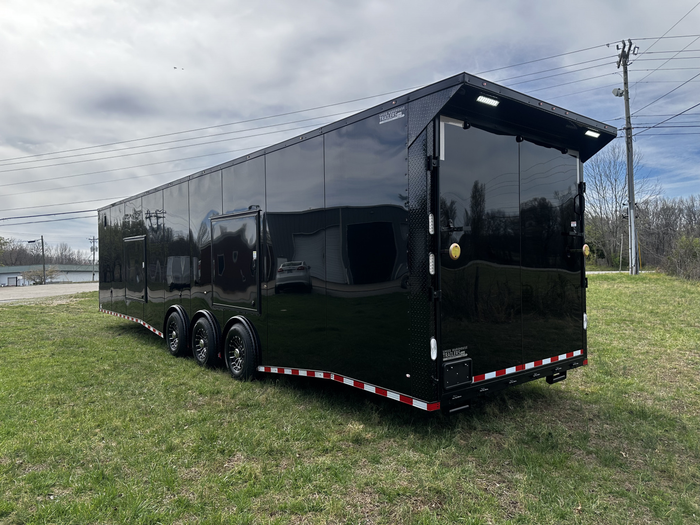 New 2026 Rock Solid Cargo 8.5x36 Car Hauler- 7000LB Spread Torsion- HD Ramp- 10" Bogey Wheels - 2 - Escape Doors Car Hauler