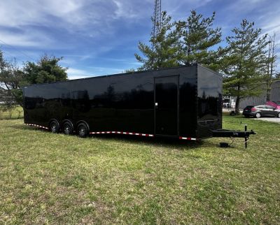 New 2026 Rock Solid Cargo 8.5x36 Car Hauler- 7000LB Spread Torsion- HD Ramp- 10" Bogey Wheels - 2 - Escape Doors Car Hauler