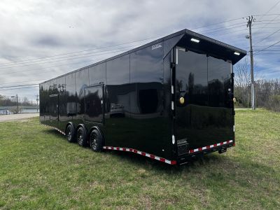 New 2026 Rock Solid Cargo 8.5x36 Car Hauler- 7000LB Spread Torsion- HD Ramp- 10" Bogey Wheels - 2 - Escape Doors Car Hauler