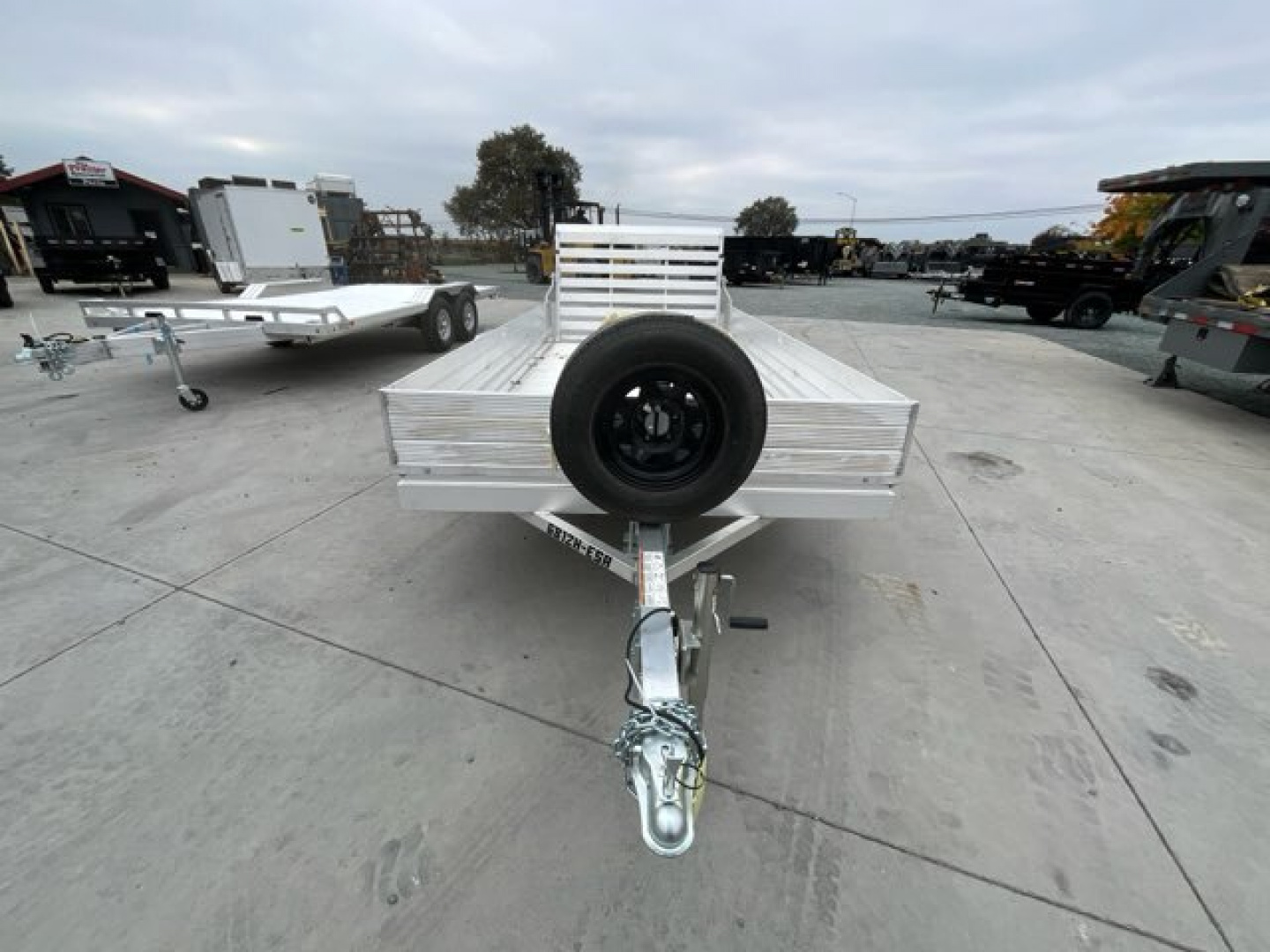 New 2025 Aluma 6812H-ESA-S-TG 5.5FT X 12FT 2990 GVW Utility Trailer