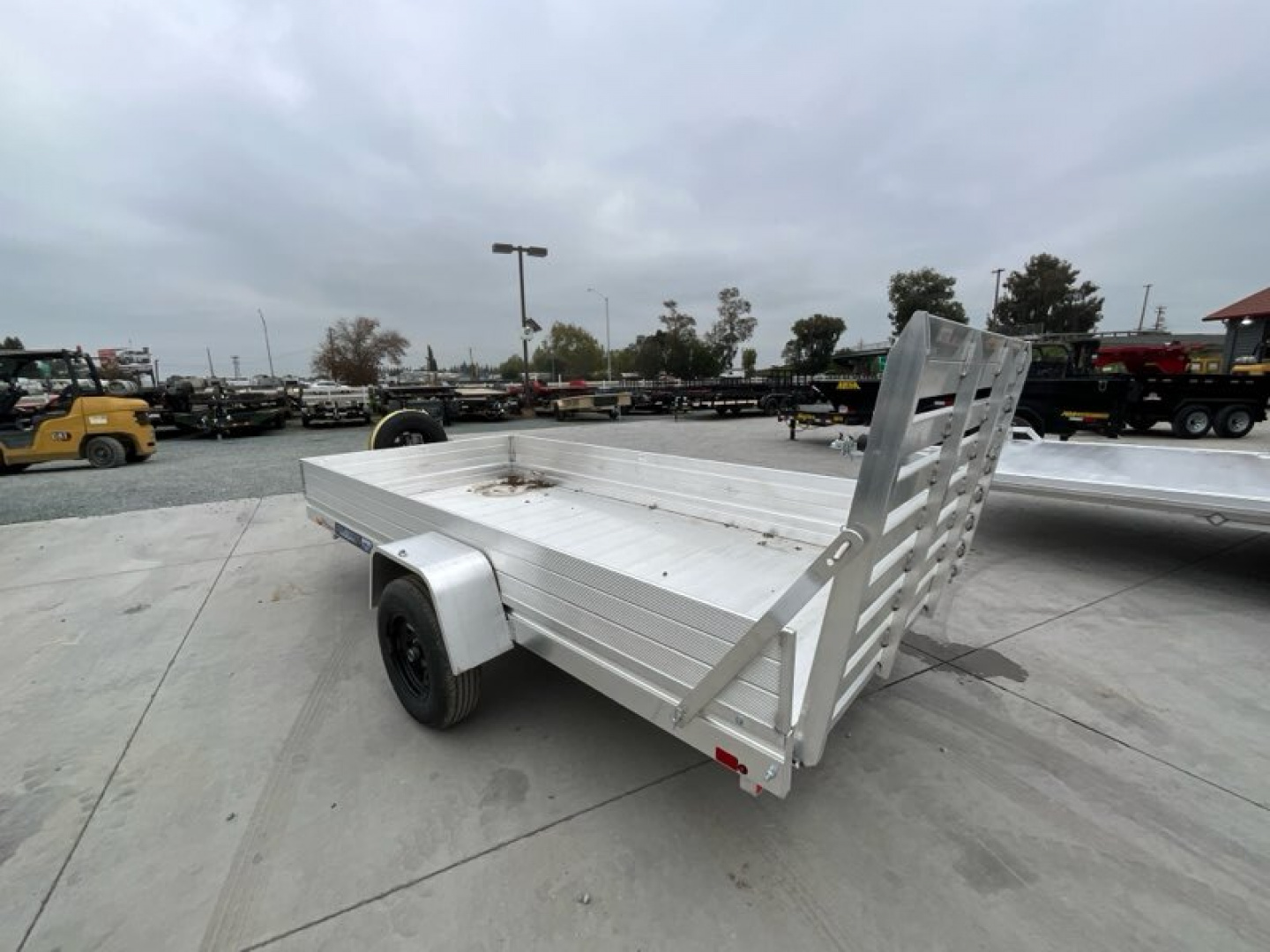 New 2025 Aluma 6812H-ESA-S-TG 5.5FT X 12FT 2990 GVW Utility Trailer