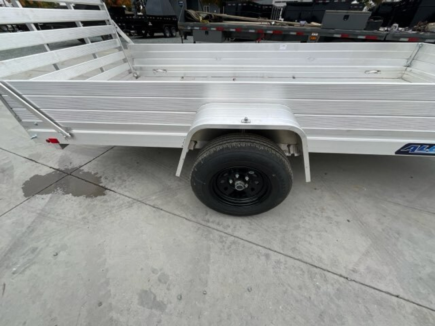 New 2025 Aluma 6812H-ESA-S-TG 5.5FT X 12FT 2990 GVW Utility Trailer