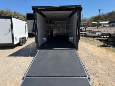 New Outlaw Light Race 8.5x30 12K Black Black-Out W/ Awning & Escape Door- RS Cab.