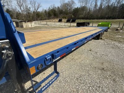 Used 2026 Load Trail LOAD TRAIL 16K 25+5 Flatbed Trailer, MAX RAMPS, 16K GVWR, SLIDING STRAPS