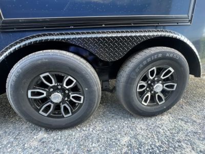New 2027 Titanium 8.5x24 TA3 Enclosed Cargo Trailer – Indigo Blue Polycore Super Stealth Blackout Package | Escape Door & Rear Spoiler with LED Lights