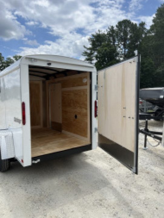 New 2026 Homesteader Trailer / Challenger Series / 5x8 / 5'7" Interior Height / Single Swing Rear Door / 32" Side Door / 24" Stoneguard / .030 White Aluminum
