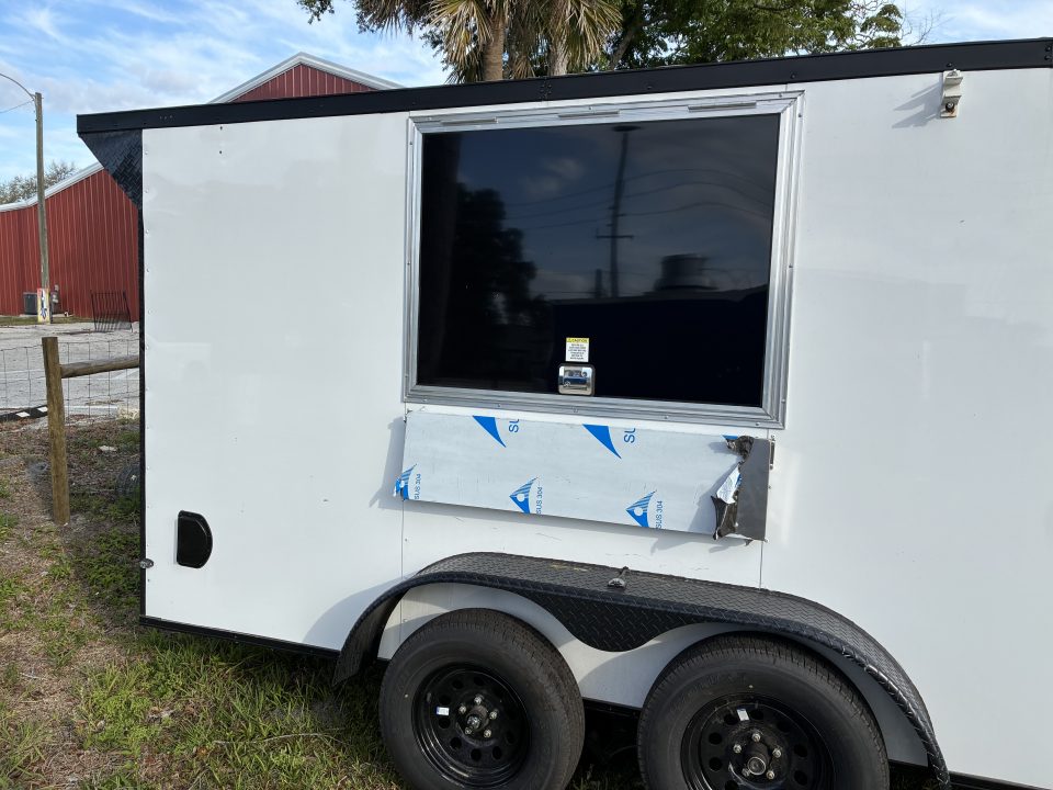 Used 2025 Cargo United LLC Food Truck 7 x 12 Dual Axle White with Blackout Package and Rear Wing with LED Lights Trailer Concession