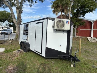 Used 2025 Cargo United LLC Food Truck 7 x 12 Dual Axle White with Blackout Package and Rear Wing with LED Lights Trailer Concession