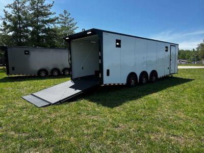New 2026 Rock Solid Cargo 8.5x28 Race Trailer-Finished Interior-Triple 7000 TORSIONS -HD RAMP-10  BOGEY WHEELS