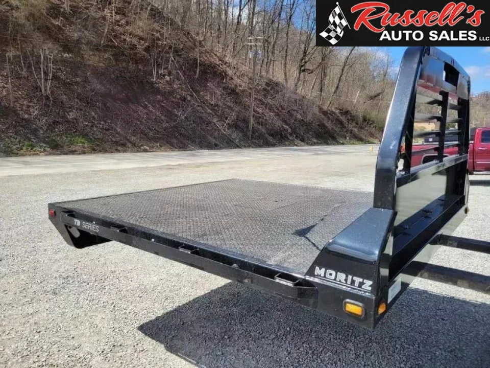New Moritz International TB8-86 DRW 8.5' Flatbed w/Trap Door and Gooseneck Hitch Plate