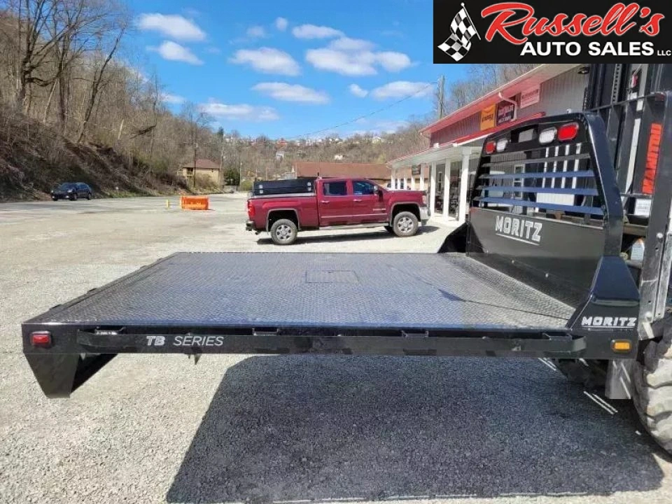New Moritz International TB8-86 DRW 8.5' Flatbed w/Trap Door and Gooseneck Hitch Plate
