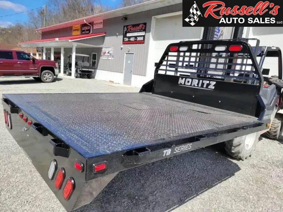 New Moritz International TB8-86 DRW 8.5' Flatbed w/Trap Door and Gooseneck Hitch Plate