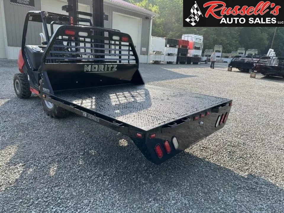 New Moritz International TB7-7 SRW 6.5' Flatbed w/Trap Door and Gooseneck Hitch Plate