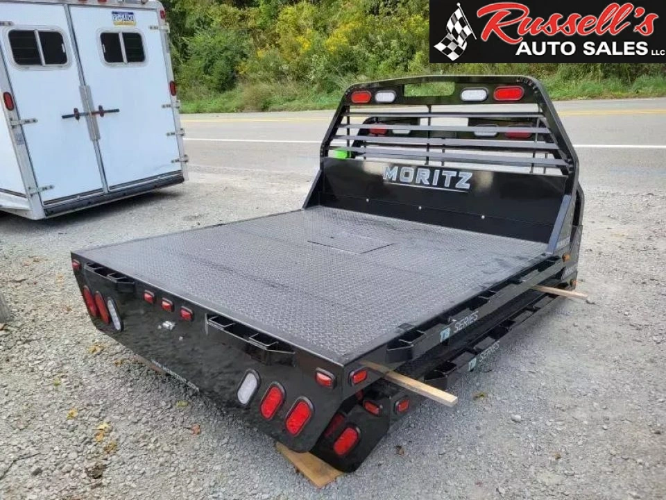 New Moritz International TB7-7 SRW 6.5' Flatbed w/Trap Door and Gooseneck Hitch Plate