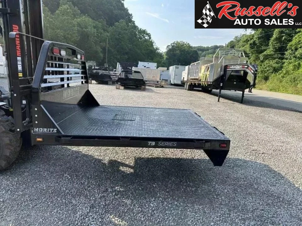 New Moritz International TB7-7 SRW 6.5' Flatbed w/Trap Door and Gooseneck Hitch Plate