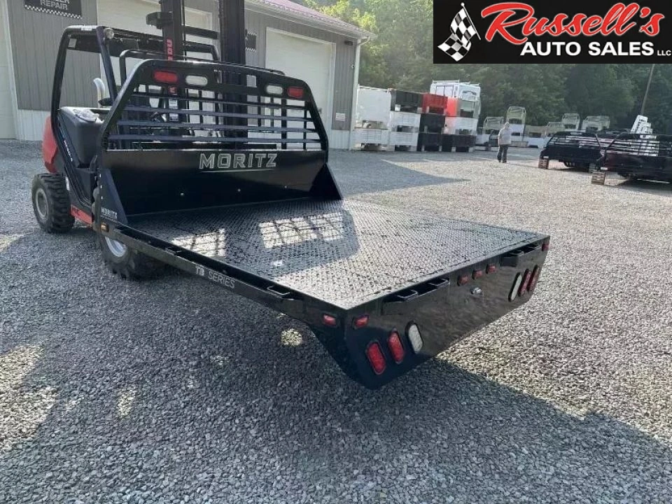 New Moritz International TB7-7 SRW 6.5' Flatbed w/Trap Door and Gooseneck Hitch Plate