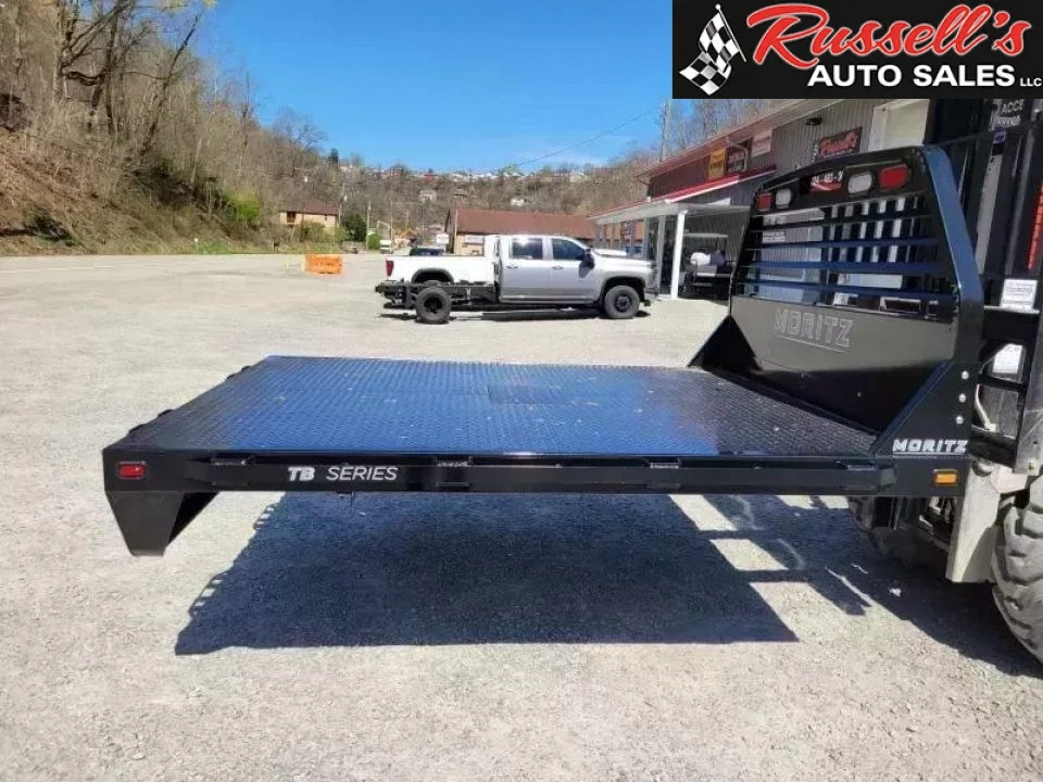 New Moritz International TB7 -86 SRW 8.5' Flatbed
