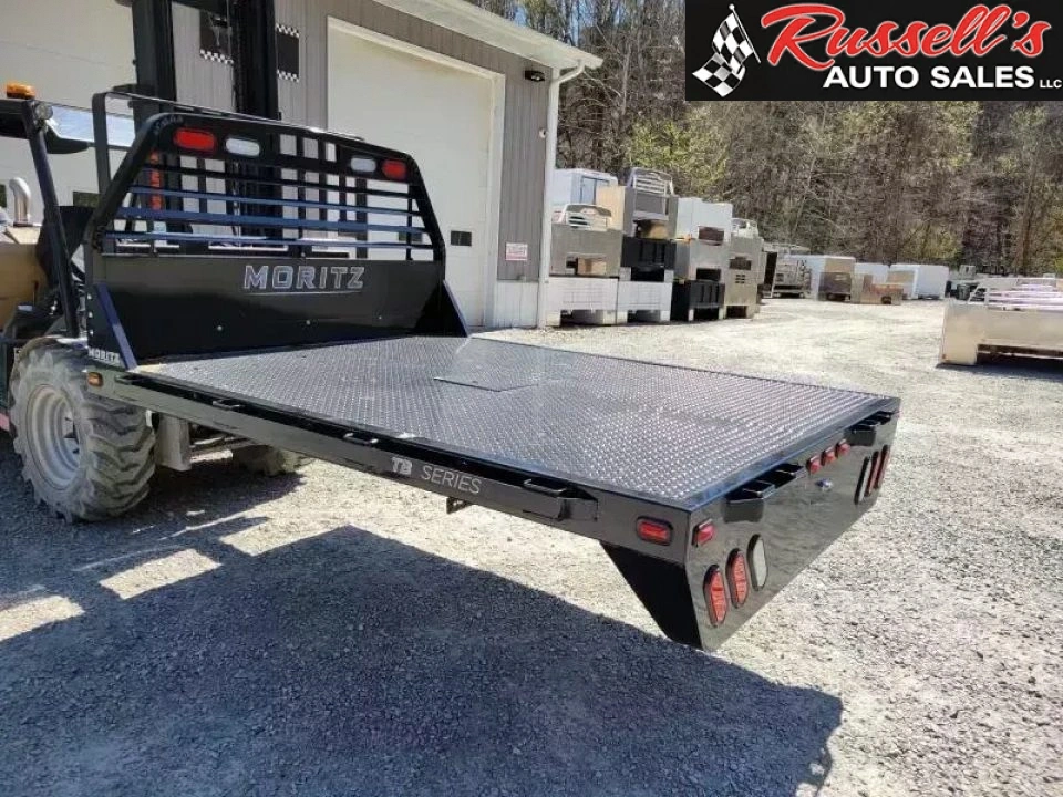 New Moritz International TB7 -86 SRW 8.5' Flatbed