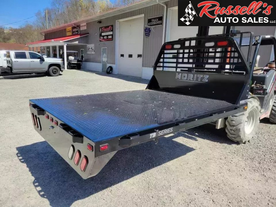 New Moritz International TB7 -86 SRW 8.5' Flatbed