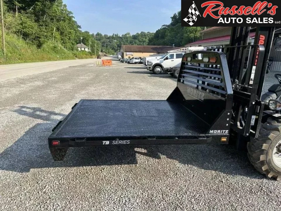 New Moritz International TB7-7 SRW 6.5' Flatbed w/Trap Door and Gooseneck Hitch Plate