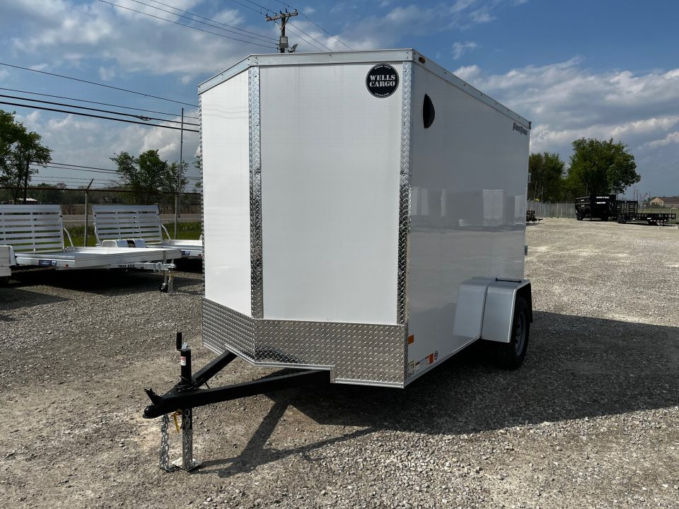 New 2026 Wells Cargo 6x10 3K FastTrac Deluxe Enclosed Trailer