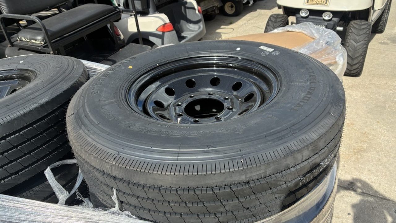 New RAINIER ST235/80R106G 14 PLY WITH BLACK WHEEL