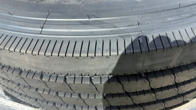 New RAINIER ST235/80R106G 14 PLY WITH BLACK WHEEL