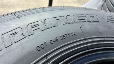 New RAINIER ST235/80R106G 14 PLY WITH BLACK WHEEL