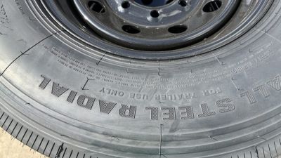 New RAINIER ST235/80R106G 14 PLY WITH BLACK WHEEL