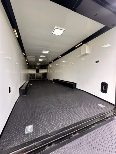 New 2026 Rock Solid Cargo 8.5x28 Race Trailer-Finished Interior-Interior-Triple 7000 TORSIONS -HD RAMP-10" BOGEY WHEELS