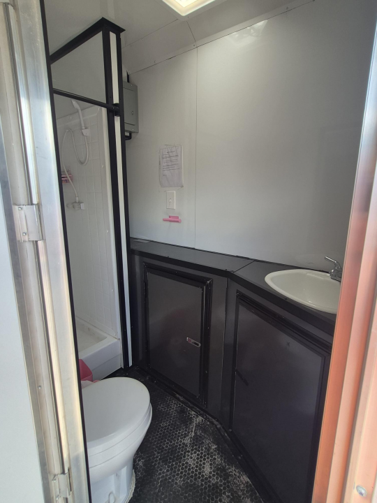 Used 2025 All World Trailers 8.5x22 Tandem Axle Toy Hauler Trailer with Restroom & Shower | Concession