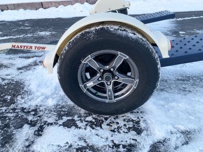 New Master Tow 83" Wide Tilt Bed Tow Dolly - Surge Brakes - Wheel Straps and Ratcheting Buckles Included!