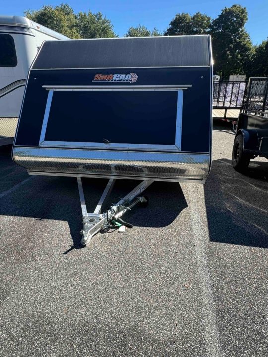 New 2026 SnoPro Trailers HYB101x12-LMME25 Snowmobile Trailer