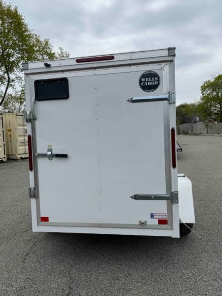 New 2026 Wells Cargo FT58S2-D Cargo / Enclosed Trailer