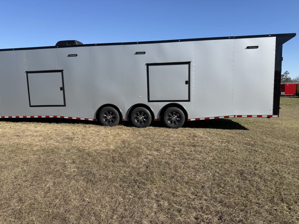 New 2027 Rock Solid Cargo 8.5x36 Triple Axle Enclosed Car Hauler – Silver Polycore Super Sport Edition