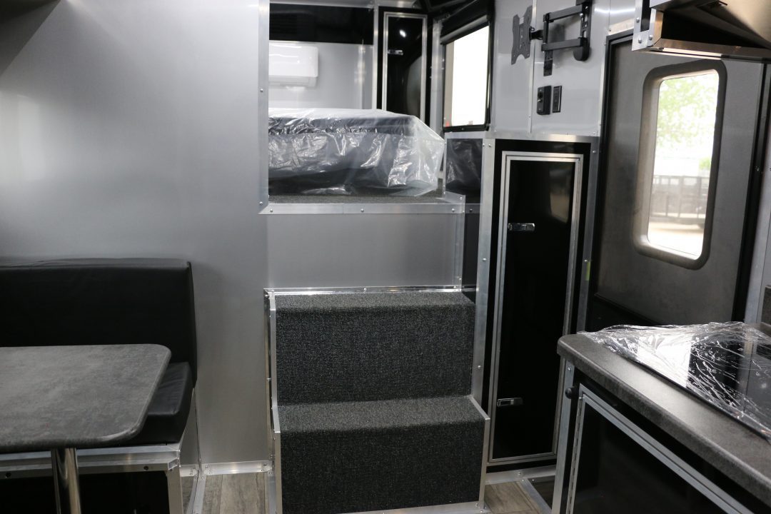 New 2026 Cargo Mate 8.5x52' ELIMINATOR SS WITH LIVING QUARTERS, MINI SPLIT, KITCHEN, AWNING, AND MORE!!!