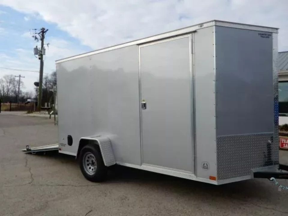 New 2027 Covered Wagon 6x10 Enclosed, 6'6" Height