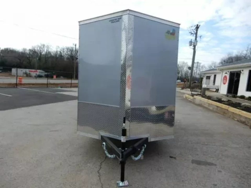 New 2027 Covered Wagon 6x10 Enclosed, 6'6" Height