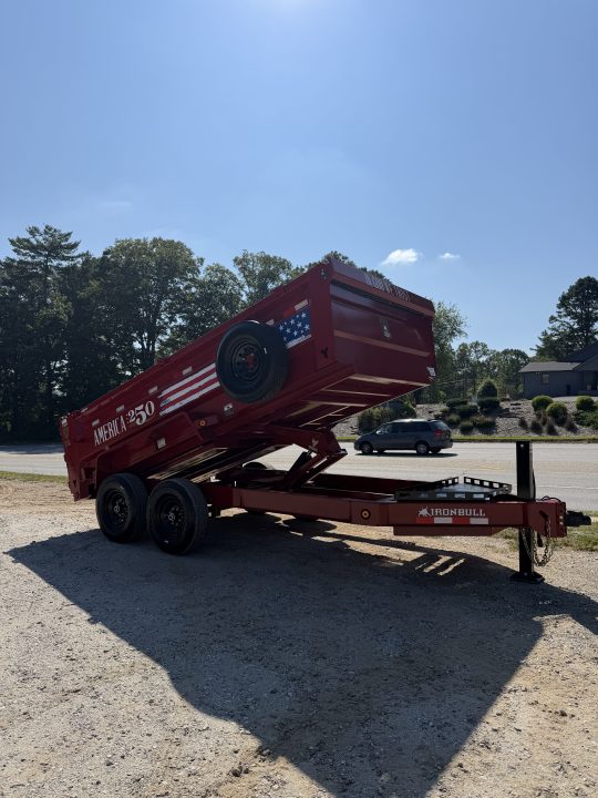 New 2027 Iron Bull DWB8314072 America 250 Series Dump Trailer /Hyd Jack / Wireless Remote / Solar Panel / 36" High Sides / 2-7k Electric Brake Axles / tarp / Alum Ramps / Combo Gate / Powder Coat Red