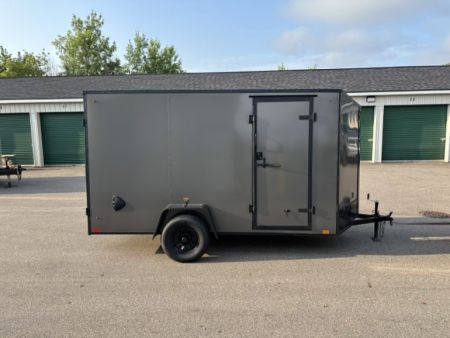 New 2027 Discovery Trailers 6x12 V-Nose Ramp Door Enclosed Trailer
