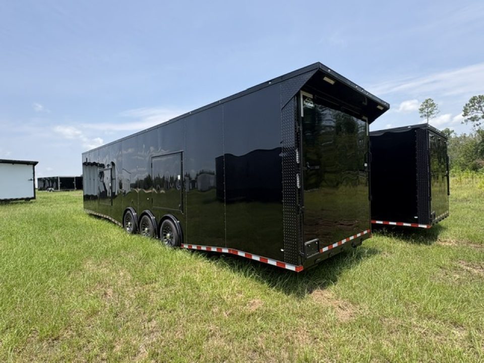 New 2027 Rock Solid Cargo 8.5x36 Triple Axle Enclosed Car Hauler For Sale – Black Polycore | Blackout Package