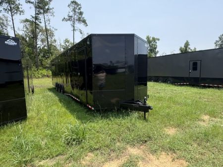 New 2027 Rock Solid Cargo 8.5x36 Triple Axle Enclosed Car Hauler For Sale – Black Polycore | Blackout Package