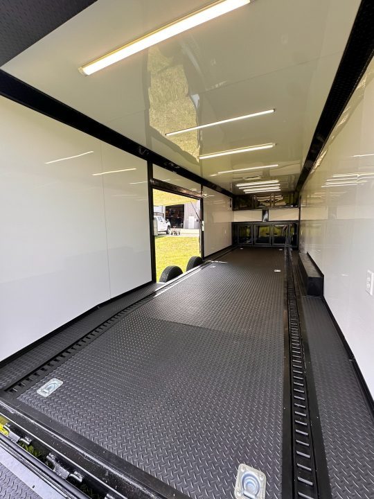 New 2026 8.5x28 Race Trailer - Finished Interior- 7000lb Spread Torsion - Recessed E-Track-Full Escape Door-Removable Fender