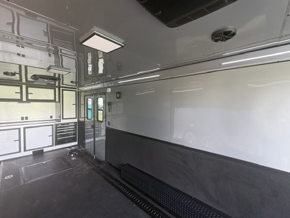 New 2027 Rock Solid Cargo Super Sport Enclosed Race Trailer For Sale Rear Spoiler Spread Axle Awning Finished Interior Cabinets A/C