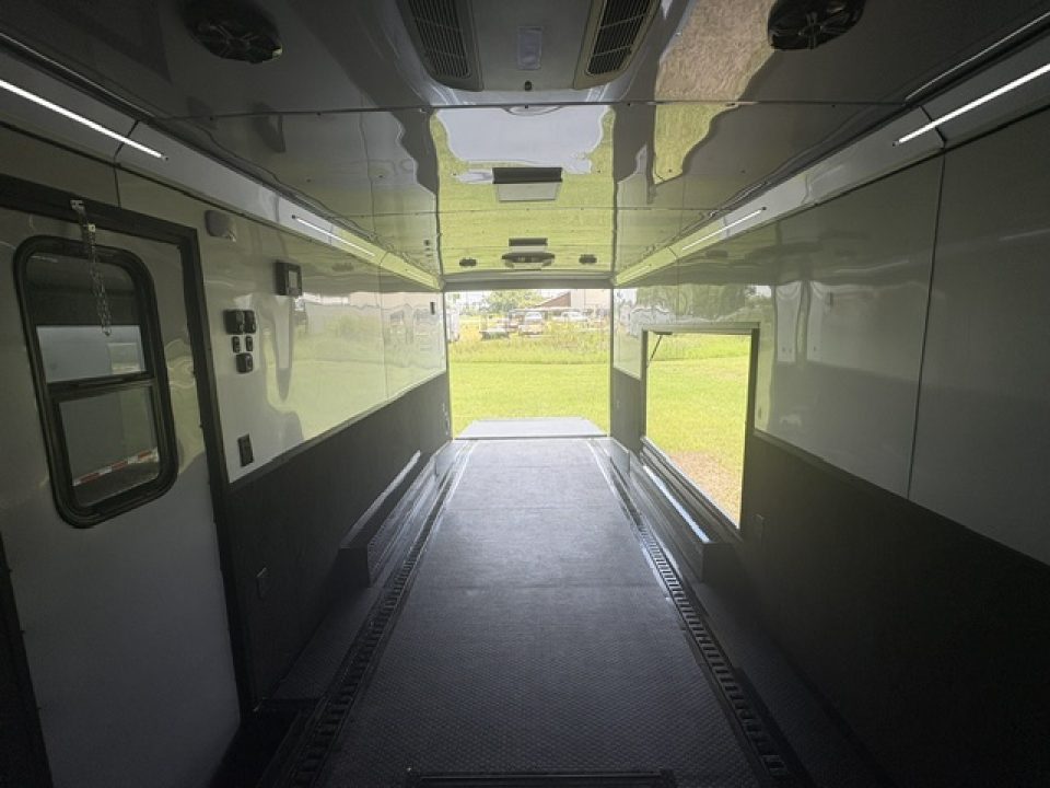 New 2027 Rock Solid Cargo Super Sport Enclosed Race Trailer For Sale Rear Spoiler Spread Axle Awning Finished Interior Cabinets A/C